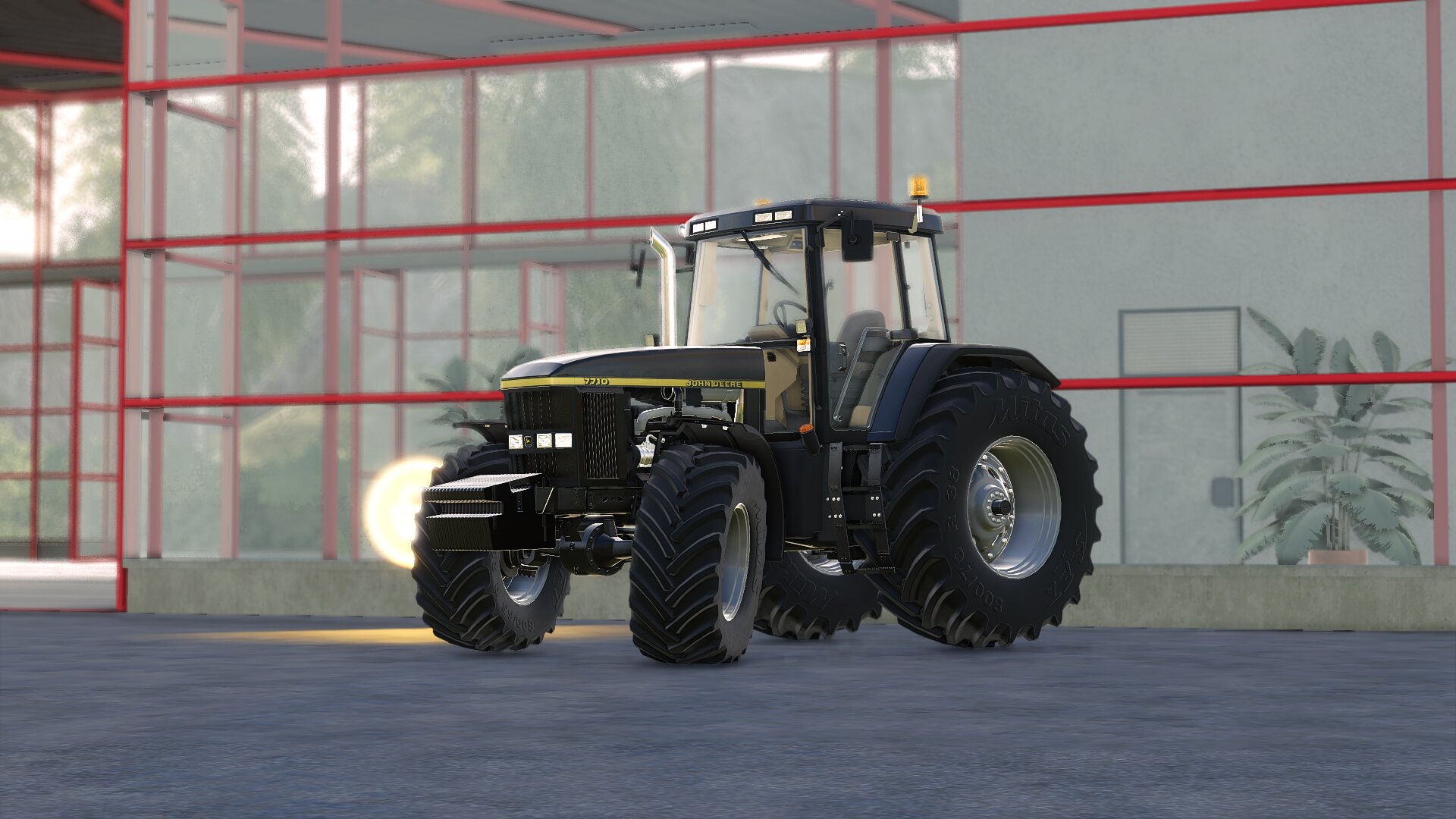 John Deere 7710 in Schwarz