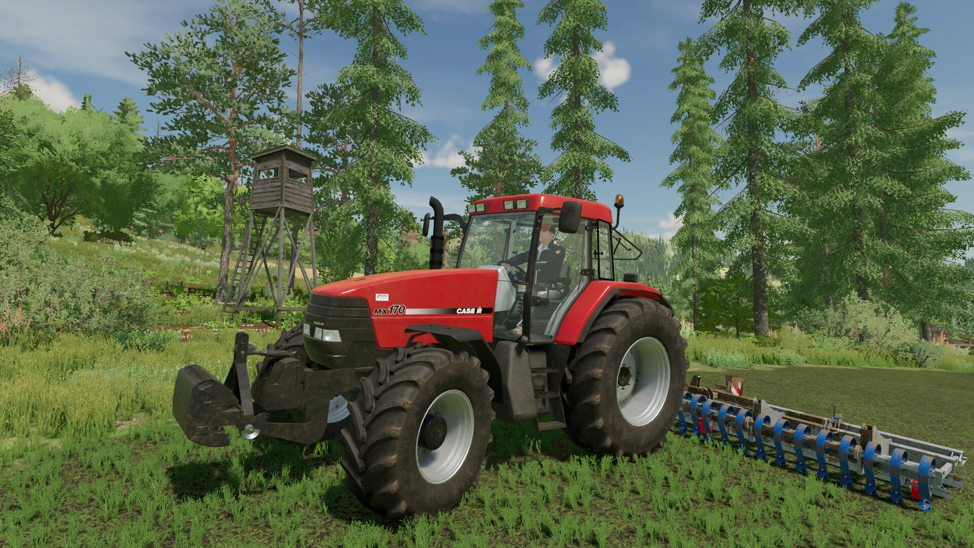 Case_IH MAXXUM MX170 beim Wiesen Striegeln