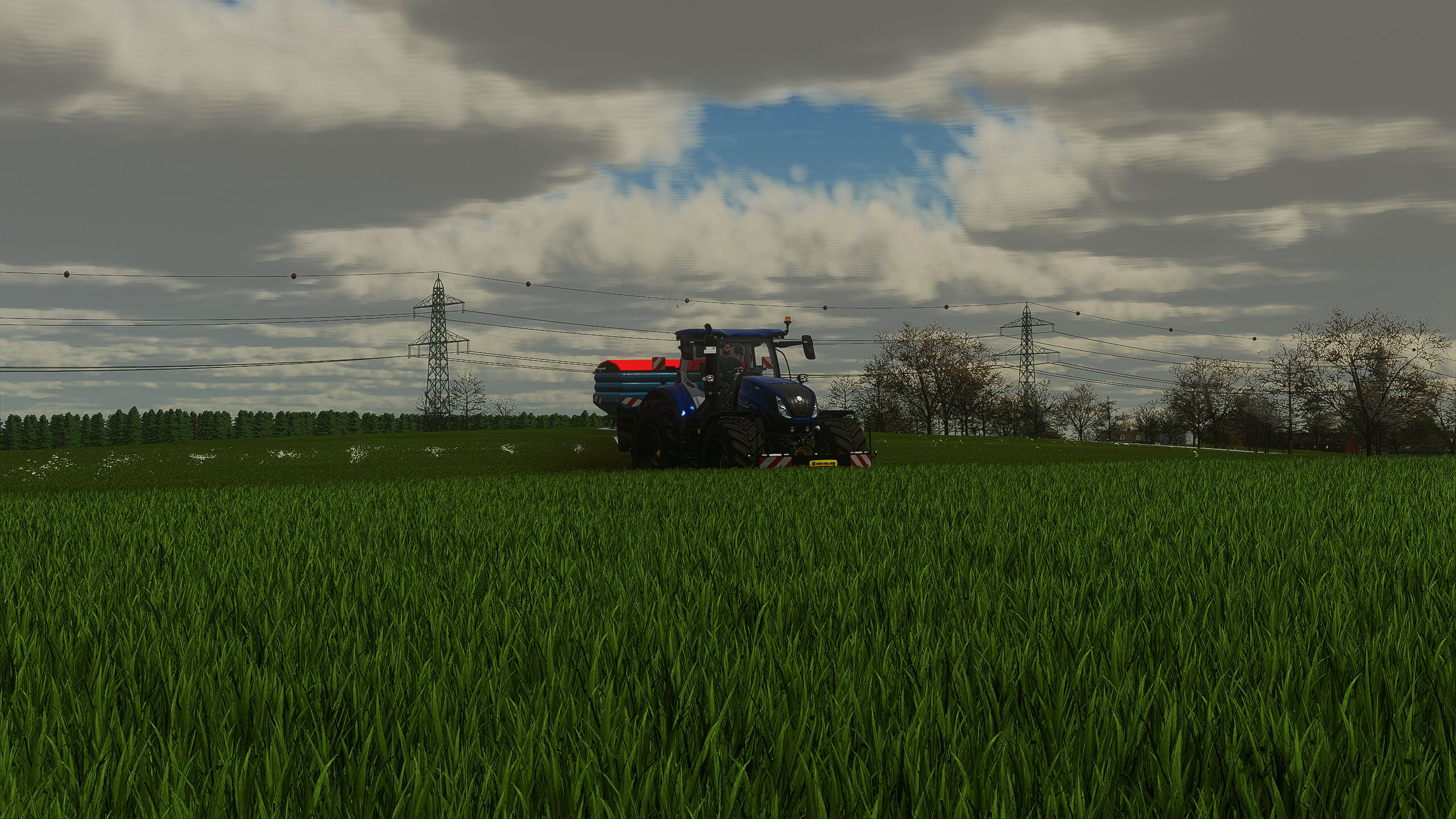 New Holland T7 am Düngen auf der Kandelin