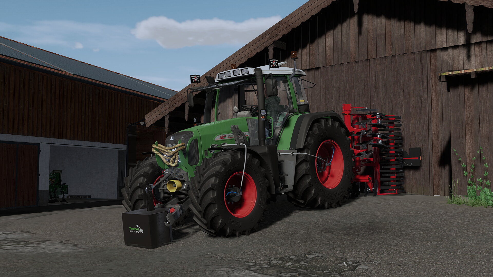 Fendt 714 Vario TMS mit 4m Scheibenegge