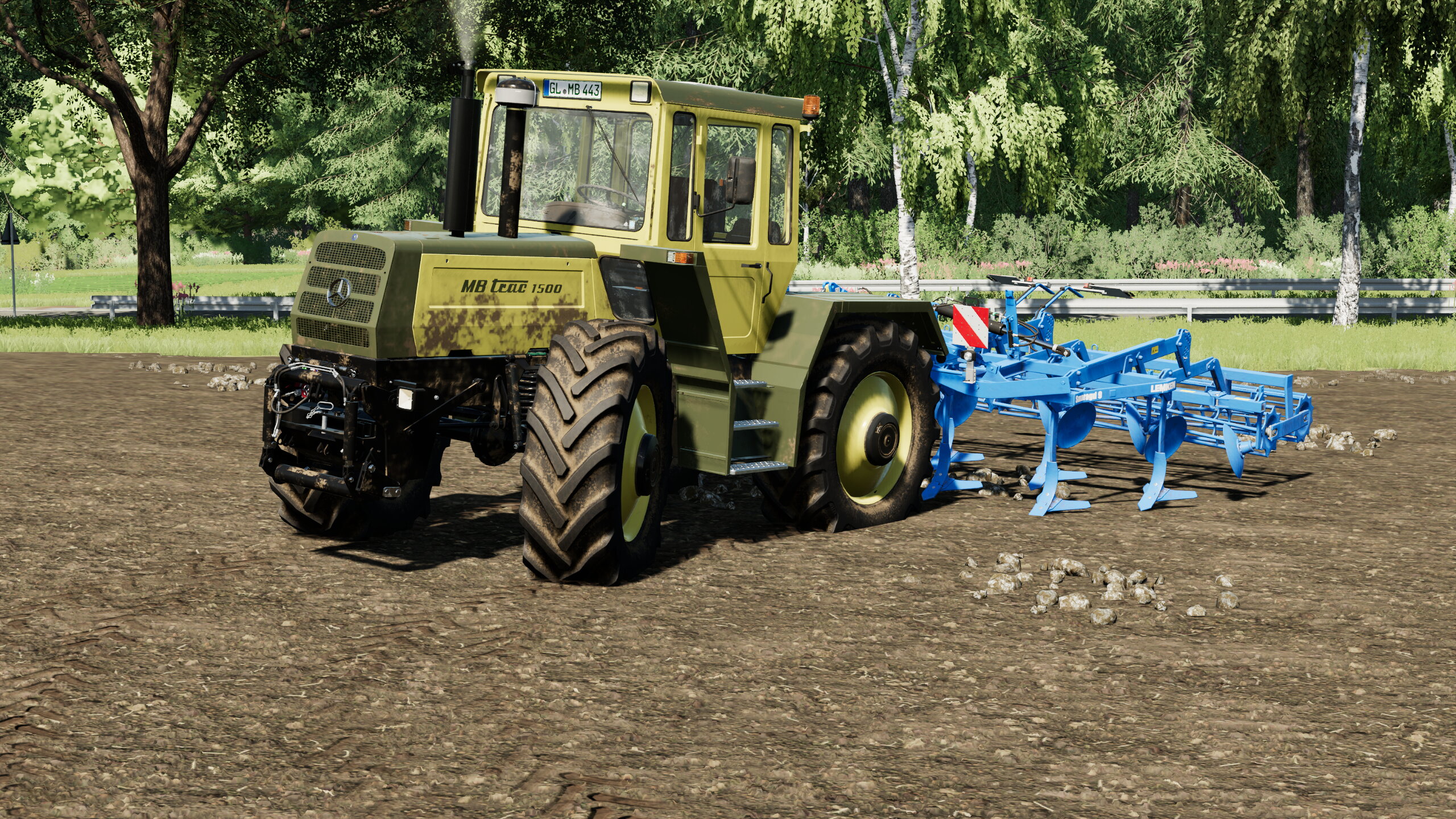 MB Trac 1500  bei  Grubbern  auf  der  Bergisch Land