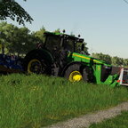 John Deere 8370R am Grubbern